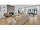 Inviting living room featuring a fireplace, built-in shelves, and an open view to the dining area at 2756 Octavia Ln, Marietta, GA 30062