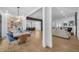 Open-concept living space with a dining area, living room, and kitchen with hardwood flooring at 2756 Octavia Ln, Marietta, GA 30062