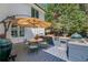 Outdoor kitchen with a built-in grill, countertop space, and a dining area, perfect for entertaining at 2756 Octavia Ln, Marietta, GA 30062