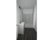 Modern bathroom with new white vanity and shower-tub combination at 4 Ivy St, Porterdale, GA 30014