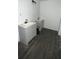 Bathroom featuring double sinks and modern fixtures at 4 Ivy St, Porterdale, GA 30014