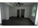 Bright open-concept living area with modern wood-look floors and natural light at 4 Ivy St, Porterdale, GA 30014