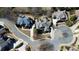 An aerial view of luxurious homes featuring beautiful landscaping in an upscale residential neighborhood at 5352 Lacosta Ln, Alpharetta, GA 30022