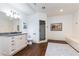 Large bathroom with white cabinets, granite countertop and glass shower at 5352 Lacosta Ln, Alpharetta, GA 30022