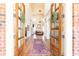 Grand foyer with high ceilings, hardwood floors, elegant chandelier, and double doors at 5352 Lacosta Ln, Alpharetta, GA 30022