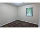Bedroom featuring plush carpet, neutral paint, a window with blinds, and standard electrical outlets at 5517 Green Wing Ct, Lithonia, GA 30058