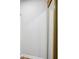 Bedroom closet showcasing closet door and base trim at 835 Navajo Trl, Covington, GA 30016