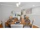 Dining room with a round table and seating for six at 835 Navajo Trl, Covington, GA 30016