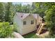 Exterior elevation of the home with deck at 835 Navajo Trl, Covington, GA 30016