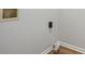 Laundry hookups with wood-look floor at 835 Navajo Trl, Covington, GA 30016