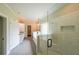 Open concept bathroom with glass shower, tile flooring, and access to a walk-in closet at 96 Lexie Ct, Rockmart, GA 30153