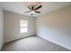 Bedroom featuring neutral walls, carpet, and a ceiling fan at 96 Lexie Ct, Rockmart, GA 30153
