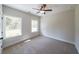 Comfortable bedroom features natural light and neutral carpet at 96 Lexie Ct, Rockmart, GA 30153