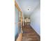Inviting entryway with wood-look floors and a light-filled view through to the living area at 96 Lexie Ct, Rockmart, GA 30153