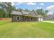 Charming single-story home with large front lawn and a covered porch with symmetrical posts at 96 Lexie Ct, Rockmart, GA 30153