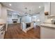 Kitchen with a functional island, stainless appliances, and seamless flow to the living area at 96 Lexie Ct, Rockmart, GA 30153
