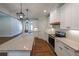 Modern kitchen features granite countertops, stainless steel appliances, and stylish pendant lighting at 96 Lexie Ct, Rockmart, GA 30153