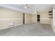 Large finished basement featuring carpet, windows, and access to other rooms at 1039 Megan Ct, Sugar Hill, GA 30518