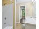 Bathroom with tub, and vanity; bright area and plenty of light at 1039 Megan Ct, Sugar Hill, GA 30518