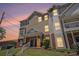 Exterior elevation of townhome with lawn and brick accents at 277 Ralph David Abernathy Sw Blvd, Atlanta, GA 30312
