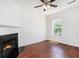 Living room with hardwood floors, fireplace, and a window at 277 Ralph David Abernathy Sw Blvd, Atlanta, GA 30312