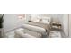 Cozy bedroom with a comfortable bed, neutral colors, side tables, and a well-lit window at 277 Ralph David Abernathy Sw Blvd, Atlanta, GA 30312