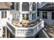 Balcony with outdoor wicker furniture, great views of the surrounding landscape, perfect for relaxing and entertaining at 4670 Hamden Forest Sw Dr, Atlanta, GA 30331