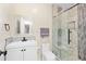 Modern bathroom with glass enclosed shower and sleek white vanity at 4670 Hamden Forest Sw Dr, Atlanta, GA 30331