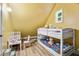 Bedroom with bunk beds and a small desk and chair at 4670 Hamden Forest Sw Dr, Atlanta, GA 30331