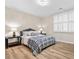 Bright bedroom with wooden floors, natural light, and stylish furnishings at 4670 Hamden Forest Sw Dr, Atlanta, GA 30331