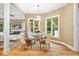 Cozy breakfast nook with hardwood floors and large windows offering views of the surrounding landscape at 4670 Hamden Forest Sw Dr, Atlanta, GA 30331