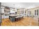 Open kitchen featuring a large island with seating and stainless steel appliances at 4670 Hamden Forest Sw Dr, Atlanta, GA 30331