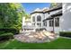 Large flagstone patio overlooking the lawn with the exterior of the house in the background at 4670 Hamden Forest Sw Dr, Atlanta, GA 30331