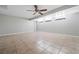 Finished basement offers versatile space with tile floors and recessed lighting at 5610 N Allen Rd, Mableton, GA 30126