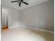 Clean bedroom with neutral walls, vinyl flooring, and ample space at 5610 N Allen Rd, Mableton, GA 30126