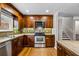 Updated kitchen with stainless steel appliances, ample cabinetry, and modern fixtures at 5610 N Allen Rd, Mableton, GA 30126