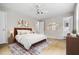 Cozy bedroom with a patterned rug and a view of the ensuite bathroom at 5610 N Allen Rd, Mableton, GA 30126