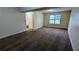 Partially finished basement leading to stairs and a closet; a versatile space for customization at 2168 Sara Ashley Way, Lithonia, GA 30058
