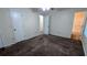 Bedroom featuring neutral walls, carpet flooring, closet space and an ensuite bathroom at 2168 Sara Ashley Way, Lithonia, GA 30058