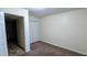 Bedroom with a closet and carpeted floors; functional space awaiting personal touches at 2168 Sara Ashley Way, Lithonia, GA 30058