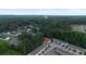 Aerial view of the townhome community surrounded by lush greenery at 3155 Tarian Way, Decatur, GA 30034