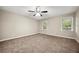 Large bedroom with plush carpeting and natural light at 3521 Brookhill Cir, Marietta, GA 30062