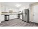 Modern kitchen with stainless steel appliances, white cabinets, and stylish countertops at 3521 Brookhill Cir, Marietta, GA 30062