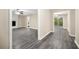 Spacious living room featuring new floors and a beautiful fireplace, perfect for relaxation and entertaining at 3521 Brookhill Cir, Marietta, GA 30062