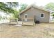 New wooden back deck with black metal railings overlooking the spacious yard at 8316 Grady St, Douglasville, GA 30134