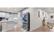 Modern kitchen featuring white cabinetry, stainless steel appliances, and a spacious island at 2456 Hidden Creek Rd, Kennesaw, GA 30152
