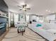 Inviting living space with a fireplace, comfortable seating, and an open layout connecting to the kitchen at 2456 Hidden Creek Rd, Kennesaw, GA 30152