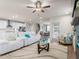 Spacious living area with an open floor plan, seamlessly connecting the living room, kitchen, and dining area at 2456 Hidden Creek Rd, Kennesaw, GA 30152