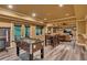 Finished basement featuring game area, luxury vinyl plank flooring, neutral paint, and walkout access at 3028 Towneside Ln, Woodstock, GA 30189