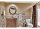 Classic bathroom with decorative fixtures, a single vanity, and tiled flooring at 3028 Towneside Ln, Woodstock, GA 30189
